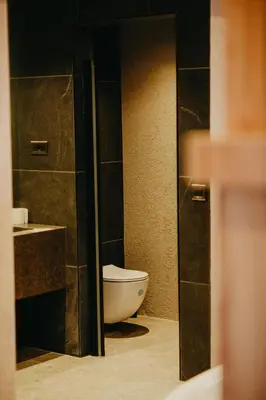 a bathroom with a toilet and a sink at Melekona House in Kartepe