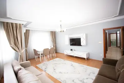 a living room with a couch and a table at Nomadia turkey in Istanbul