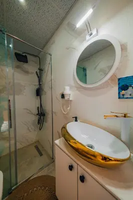 a bathroom with a sink and a mirror at tetova in Sapanca