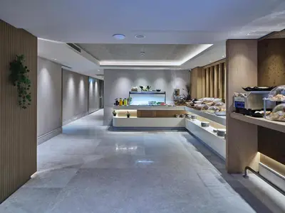 a long hallway with aasteryasteryasteryasteryasteryasteryasteryasteryasteryasteryastery at Four-G Hotel Premium in Istanbul