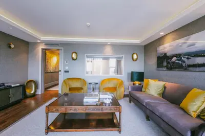 a living room with a couch and a table at Eva Bosphora Waterfront Living in Istanbul