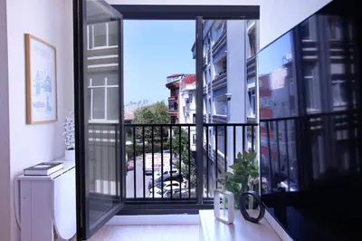a balcony with a view of a building at Excellent Apartments Fatih Nova in Istanbul