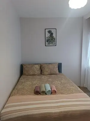 a bed with three pillows on top of it at Üsküdar'da Tam Size Göre S in Istanbul