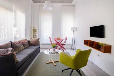 a living room with a couch and a table at Cute Compact 1Bd1Bath Gem Shared Terrace! #397 in Istanbul