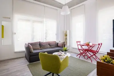 a living room with a couch and a table at Cute Compact 1Bd1Bath Gem Shared Terrace! #397 in Istanbul