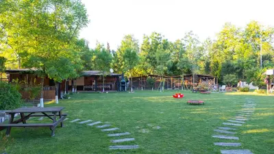 a park with a picnic table and a playground at Sapanca Cayir Cimen Otel in Sapanca