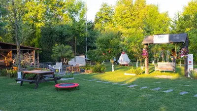 a park with a picnic table and a red frisbee at Sapanca Cayir Cimen Otel in Sapanca