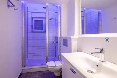 a bathroom with a shower and a toilet and a sink at Cool Charming Central 1BD1Bath Modern Home! #398 in Istanbul