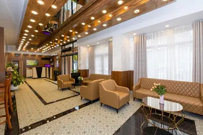 a lobby of a hotel with couches and chairs at Mays Otel in Istanbul