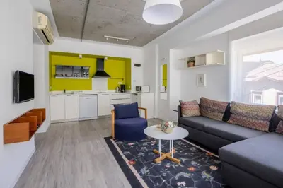 a living room with a couch and a table at Cozy Coastal Hideaway with Bosphorus Breeze! #399 in Istanbul