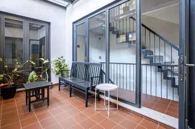 a balcony with a bench and a table at Cozy Coastal Hideaway with Bosphorus Breeze! #399 in Istanbul
