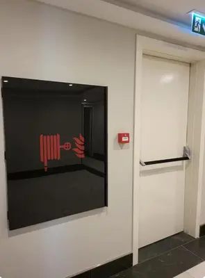 a flat screen tv on the wall of a building at Taksim The 360 Hearth Of İstanbul 55-56 in Istanbul