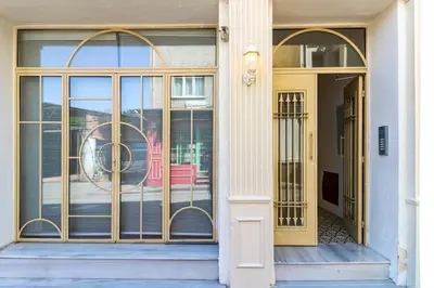 a front door of a building with a gate at Balatella Suites in Istanbul