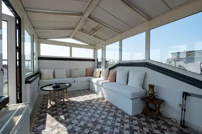 a living room with a couch and a table at House with Terrace in Sultanahmet in Istanbul