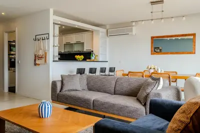 a living room with a couch and a table at Bosphorus View with 3 Bedrooms and 2 Bathrooms in Istanbul
