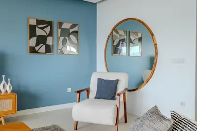 a room with a chair and a mirror at Bosphorus View with 3 Bedrooms and 2 Bathrooms in Istanbul