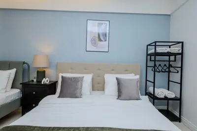 a bedroom with a large bed with white sheets and pillows at Bosphorus View with 3 Bedrooms and 2 Bathrooms in Istanbul