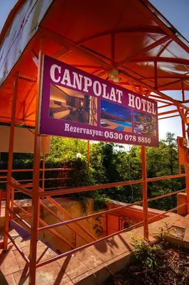 a sign for a train station with a sign for a hotel at CANPOLAT Sapanca Hotel in Sapanca