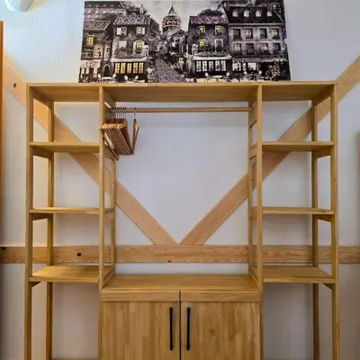 a wooden book shelf in a room at Uludag Nefes Echoes by the Woods in Uludag