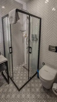 a bathroom with a shower and a toilet at Balat Side Apart in Istanbul
