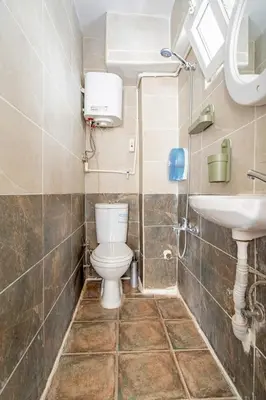 a bathroom with a toilet and a sink at 1st Floor Historic Flat in Old Istanbul in Istanbul