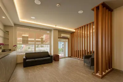 a lobby with a couch and chairs in a building at Ferah Otel in Gebze