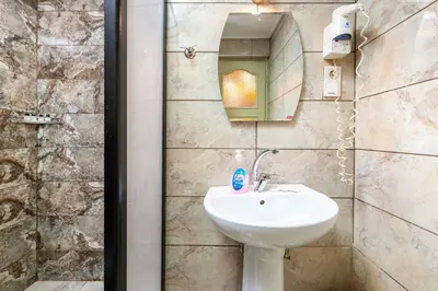 a bathroom with a sink and a mirror at Kadirga Studios in Istanbul