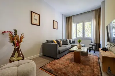 a living room with a couch and a tv at 3 Bedrooms and Central Location in Istanbul