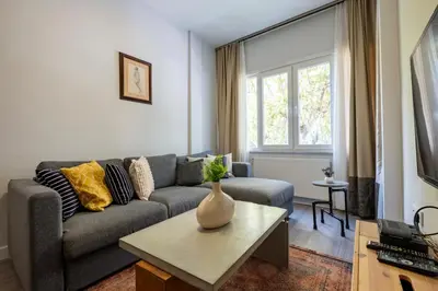a living room with a couch and a table at 3 Bedrooms and Central Location in Istanbul