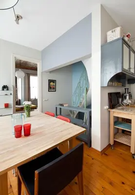 a kitchen and dining room with a wooden table at 3 Bedroom, 2 Bathroom Fully Equipped House in Istanbul