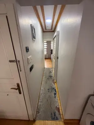 a hallway with a door and a ceiling at Taksim Of The City in Istanbul