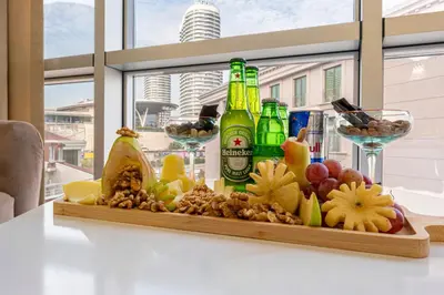 a tray of fruit and bottles of beer on a table at Mall Off Palace in Istanbul