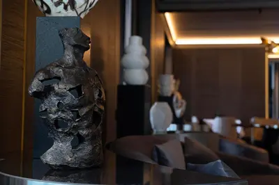 a vase sitting on top of a glass table at Arbor Hotel - Signature Collection in Istanbul