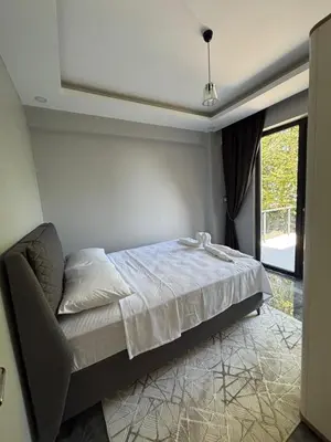 a bedroom with a bed and a window at Villa in nature in Sapanca