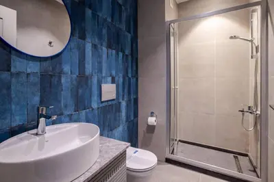 a bathroom with a sink and a shower and a toilet at Cute Intimate Airy 1Bed1Bath Nisantasi Home! #405 in Istanbul