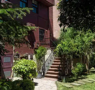 a building with a staircase in front of it at Beautiful Modern Bright 2BD Patio Duplex #179 in Istanbul