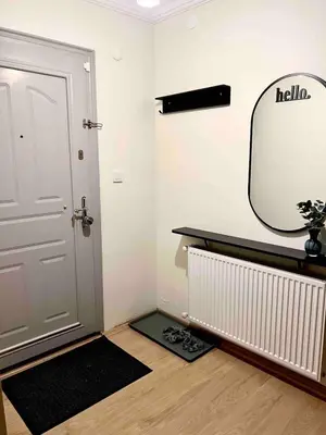 a room with a door and a mirror on the wall at Cozy 4BR Villa with Lake View and Comfort Galore in Sapanca
