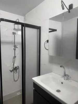 a bathroom with a shower and a sink and a sink at Disa - Hotel Galata in Istanbul