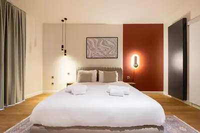 a bedroom with a large white bed with two pillows at Galata 21,1 in Istanbul