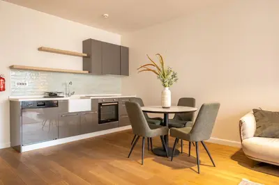 a kitchen and dining room with a table and chairs at Galata 21,1 in Istanbul