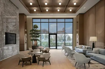 a lobby with a waiting room with couches and chairs at Marriott Executive Apartments Istanbul Tema World in Istanbul