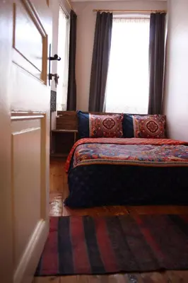 a bedroom with a bed and a window at High Garden Rooftop Terrace Apartment Around Galata Tower in Istanbul