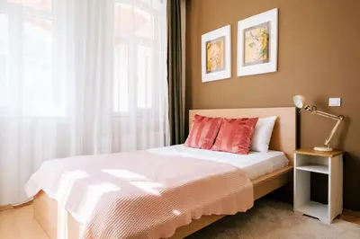 a bedroom with a bed and a window at Upscale Apartments w Balcony - Near Istiklal in Istanbul