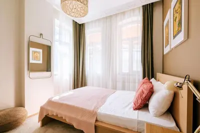a bedroom with a bed and a window at Upscale Apartments w Balcony - Near Istiklal in Istanbul