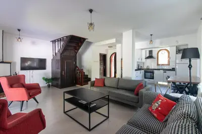 a living room with a couch and chairs and a table at 4BR all AC Pool BBQ Garden on Bagdat Ave Kirkpinar in Sapanca