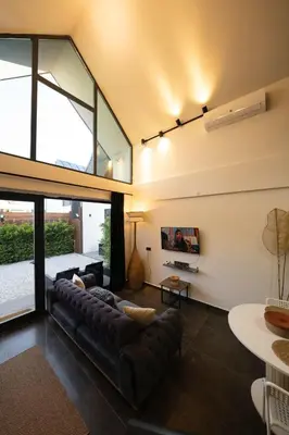 a living room with a couch and a table at Monk Living Space in Kocaeli