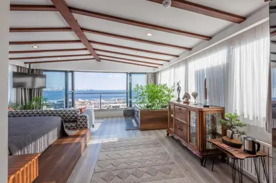 a living room with a bed and a couch at Romantic Hotel Istanbul in Istanbul