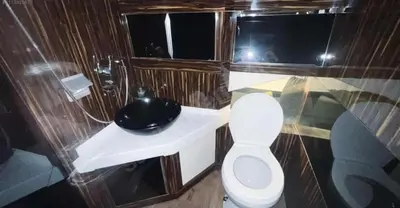 a small bathroom with a toilet and a shower at mrsMERİMA in Bursa