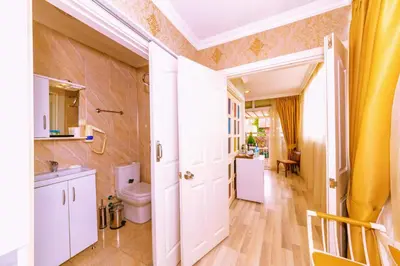 a bathroom with a toilet and a sink at Walnut Shell Hotel in Istanbul