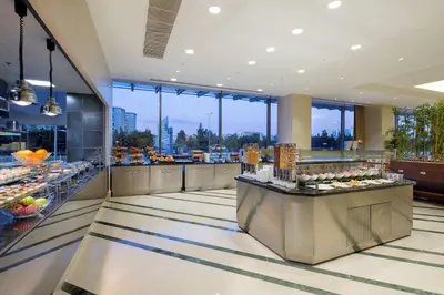a bakery with a view of the city from the lobby at Hilton Garden Inn Istanbul Beylikduzu in Istanbul